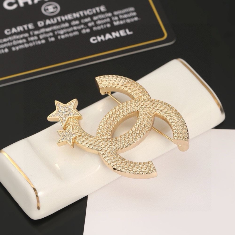 Ch**el brooches